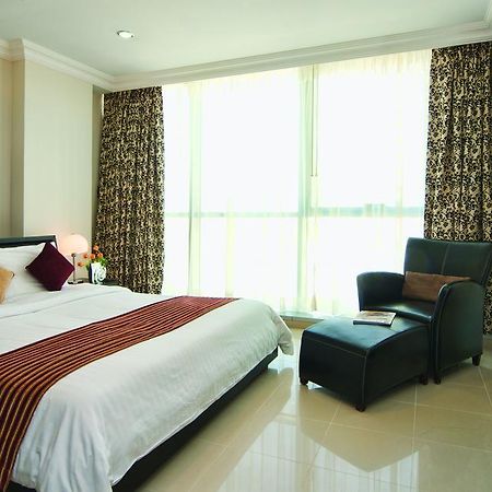 Retaj Residence Al Corniche Доха Стая снимка